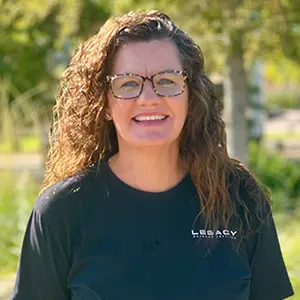 picture of Amy dressed in a black t-shirt