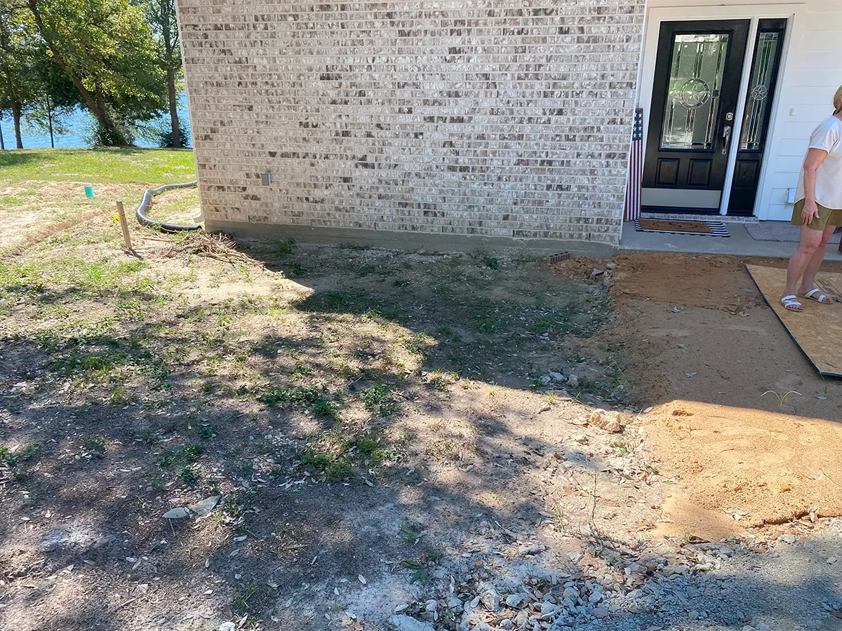 The backyard of a home before a landscaping project