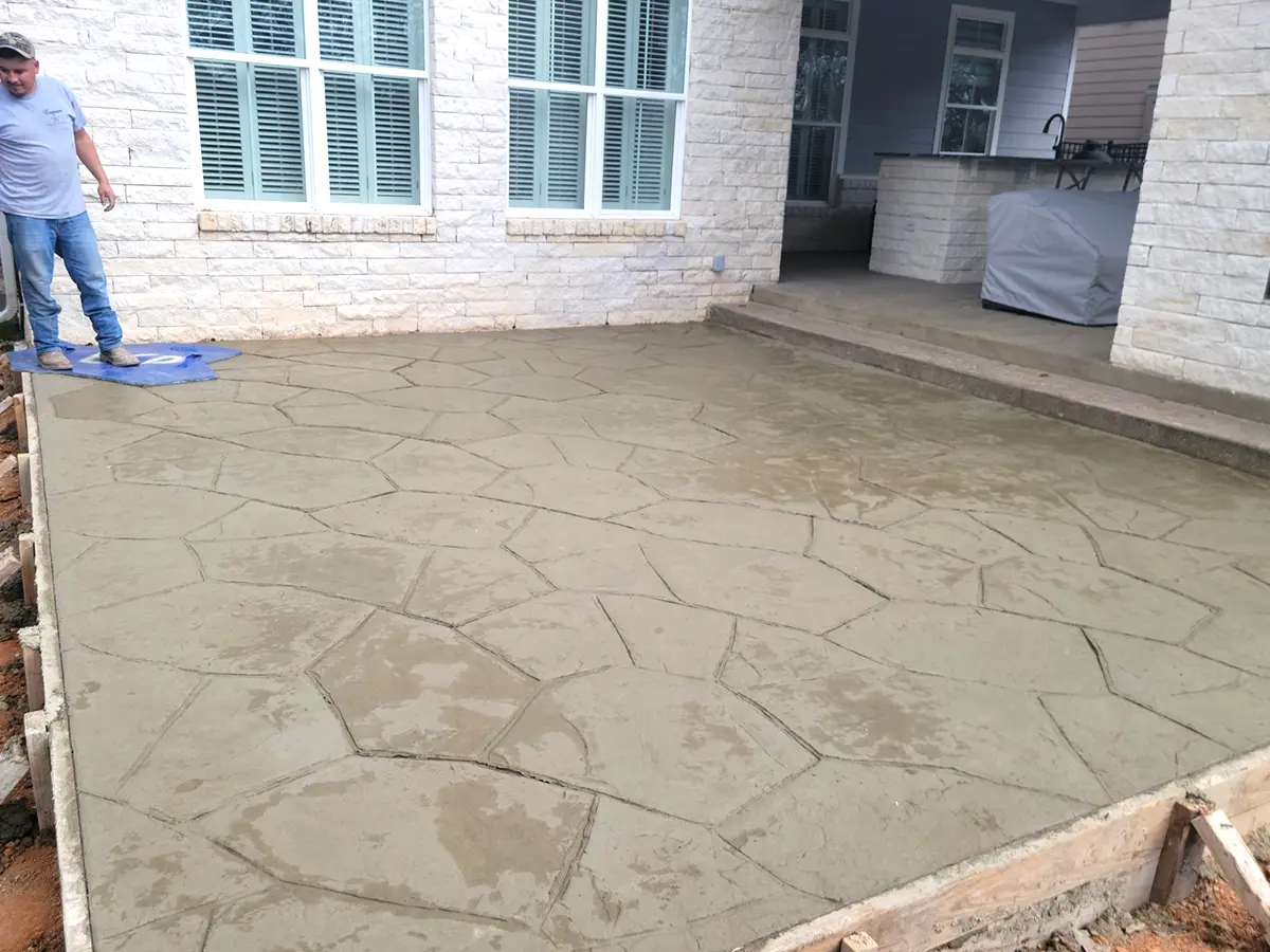 Stamped concrete patio finished by Legacy Outdoor Services in Texas