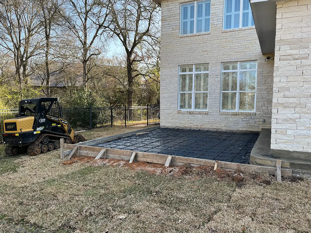 Framing and rebar for a stamped concrete patio in Texas by Legacy Outdoor Services