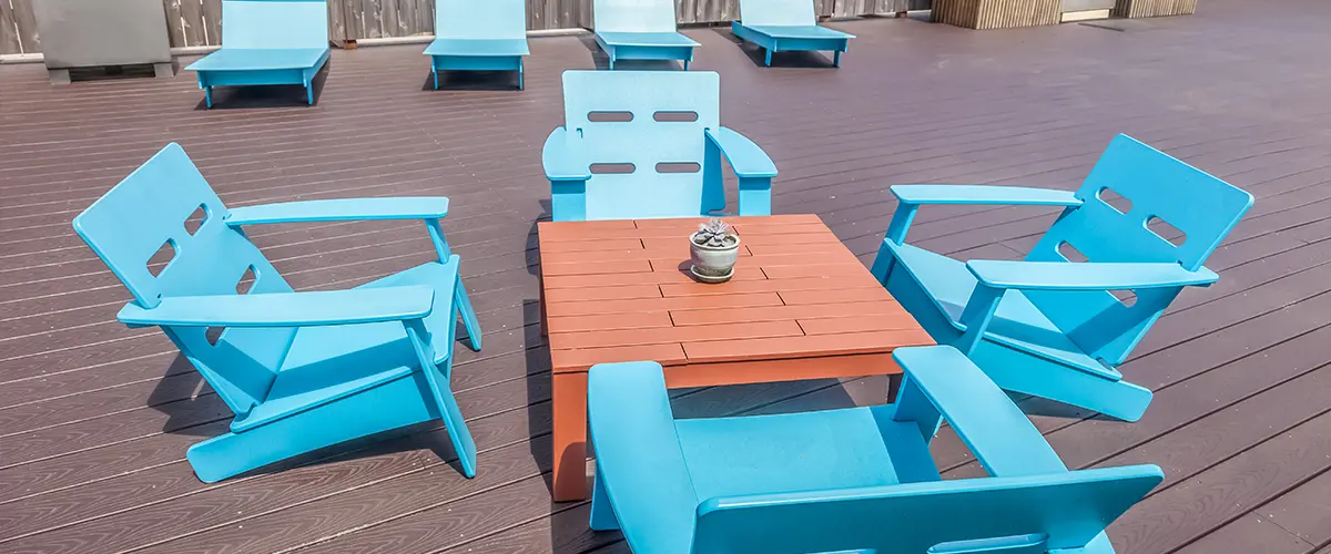 modern rooftop deck with blue poly lumber patio furniture